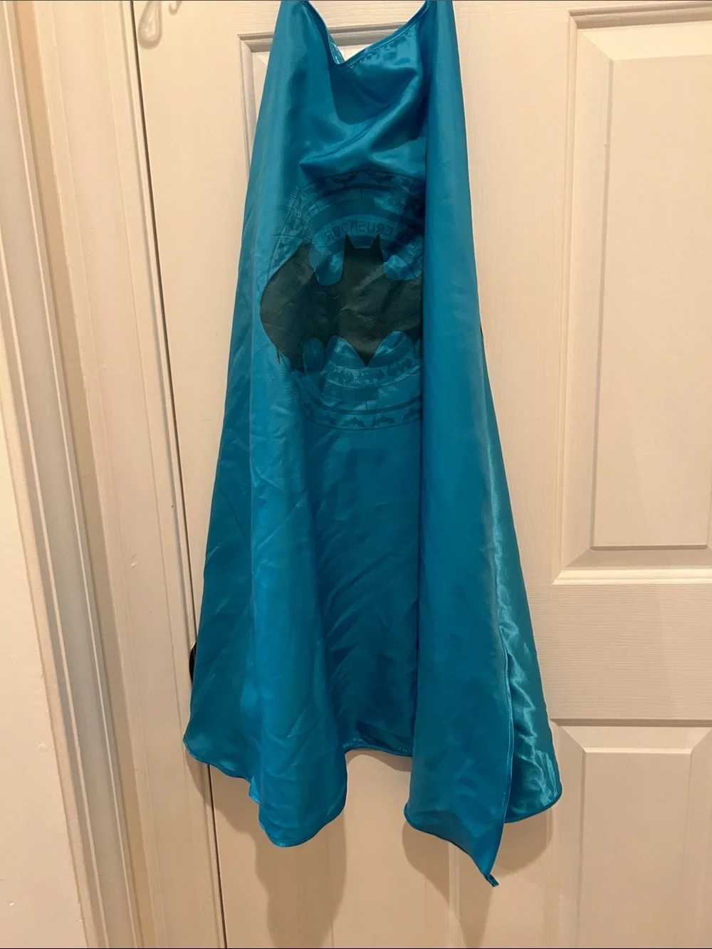 Bright blue Batman cape